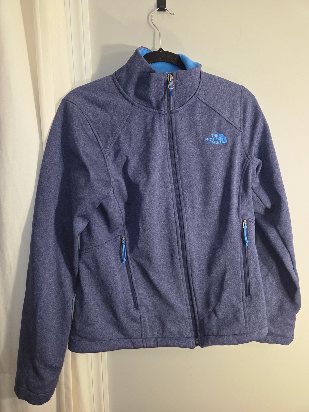 The North Face Women’s Heathered Navy Softshell Jacket with Sky Blue Accents